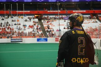 Miles Thompson of the Iroquois Nationals waits for Canada to come back onto the field.